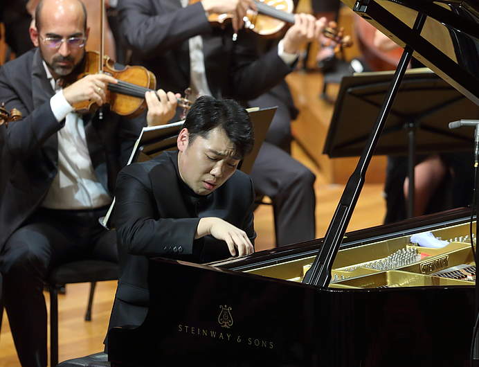 The Orchestre de la Suisse Romande on tour at the National Center for the Performing Arts in Beijing with pianist George Li and conductor Jonathan Nott